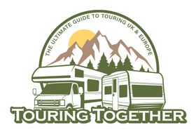 Motorhome and caravan touring together in the mountains