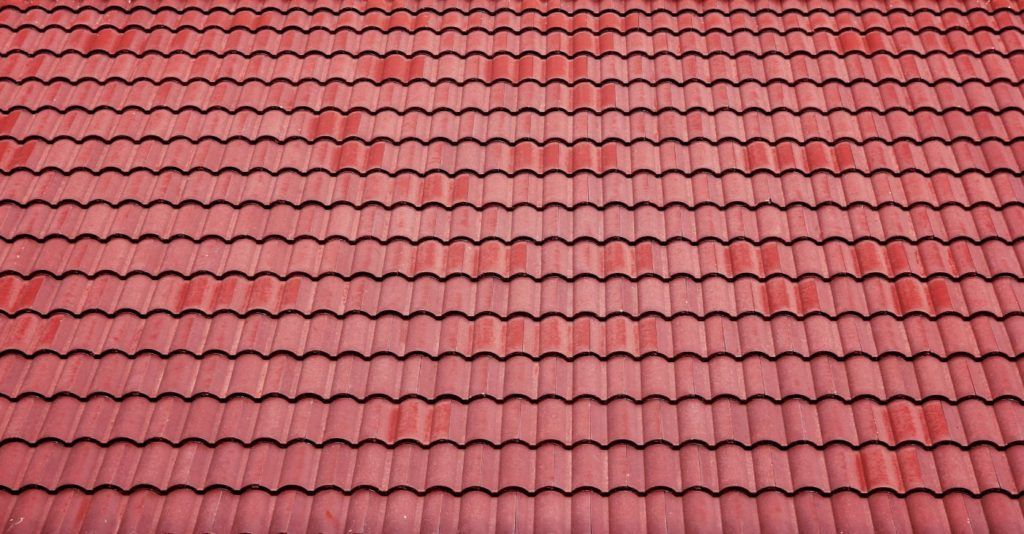 A close up of a red tiled roof.