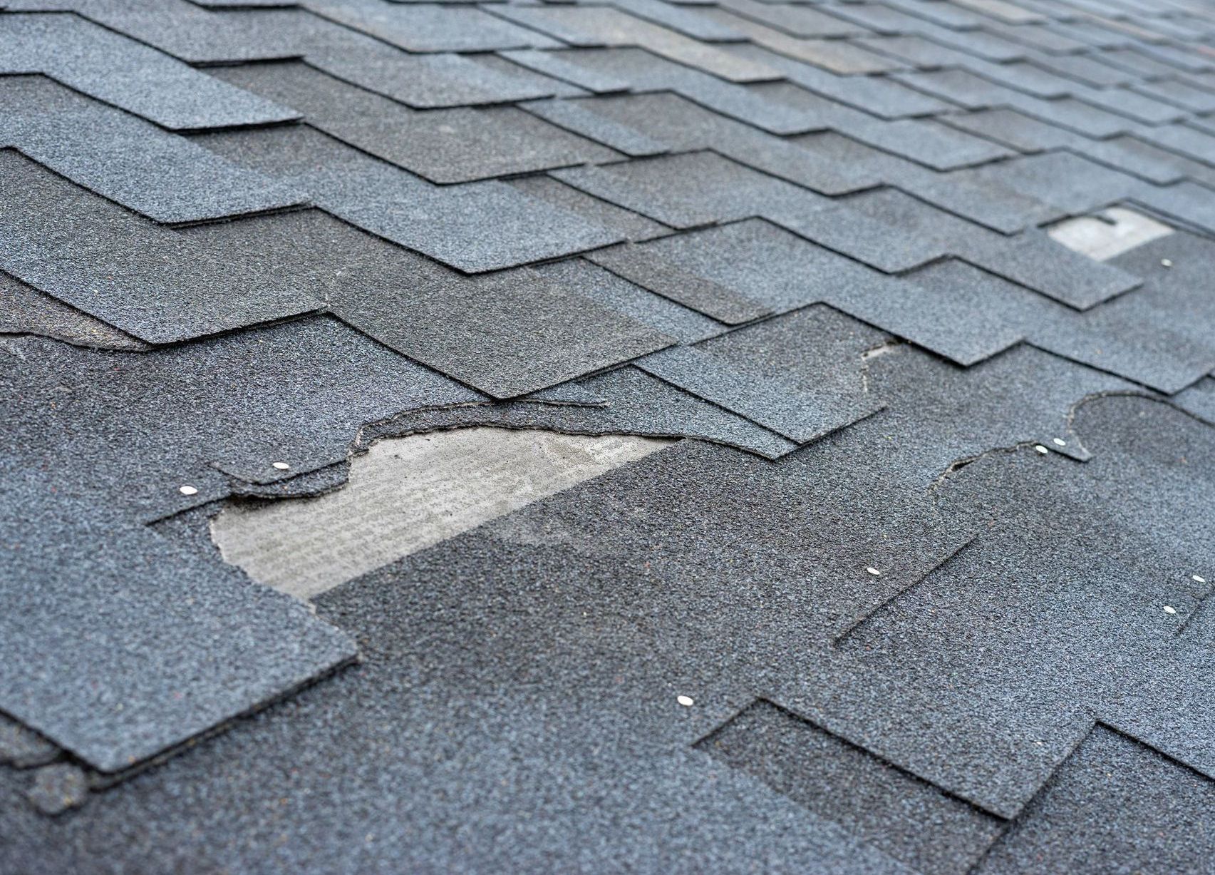 A close up of a roof with a hole in it.