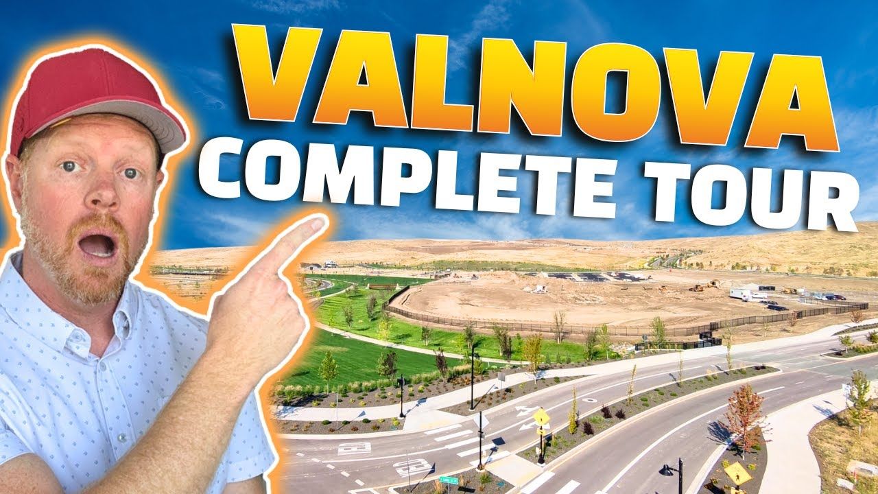 Man in a red cap points to a large new construction development called Valnova.