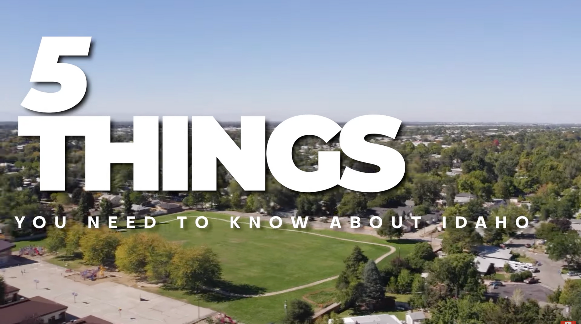 Aerial view of a neighborhood with text reading ‘5 Things You Need to Know About Idaho.’