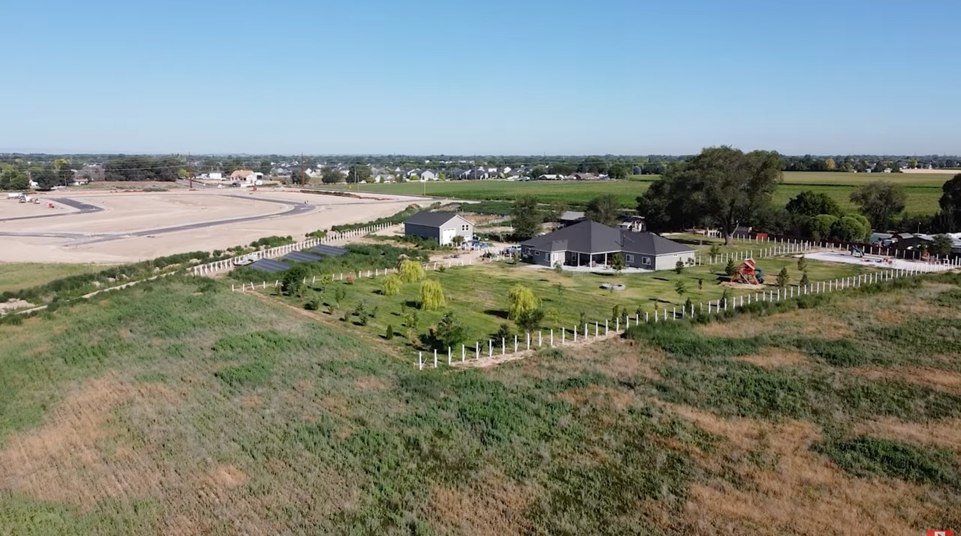 New construction homes in Nampa Idaho with nearby farm fields and a growing neighborhood