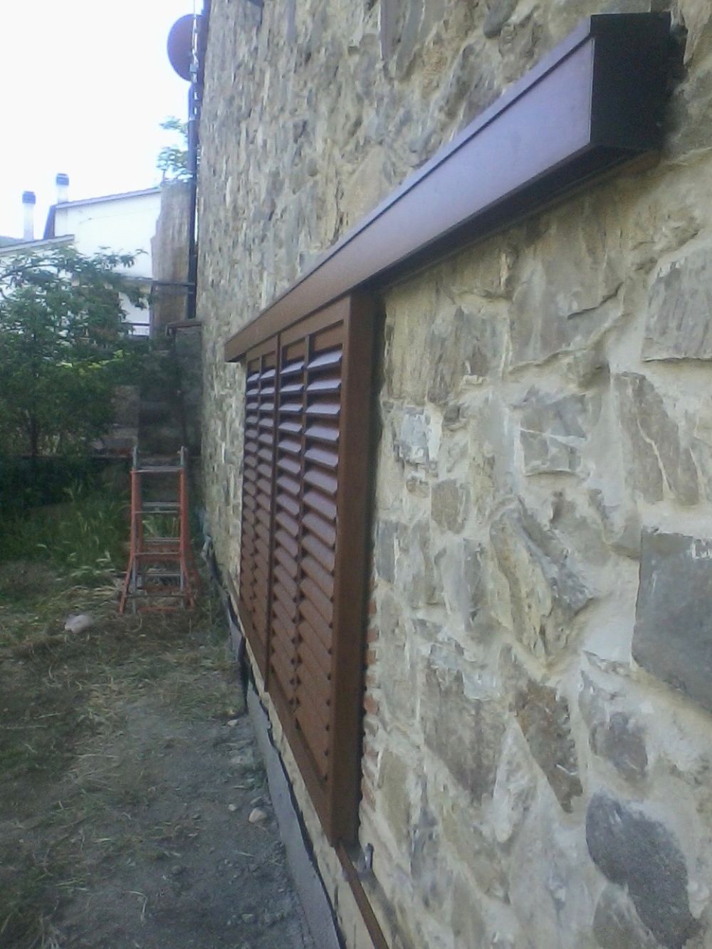 Persiana con apertura a scorrimento