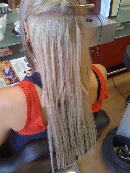 blonde hair being straightened
