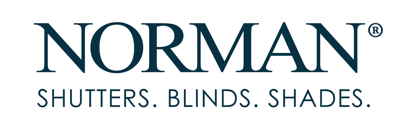 The Norman brand logo in dark blue text, reading 