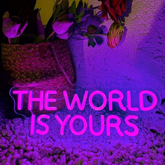 Neon sign in bright pink letters reads 