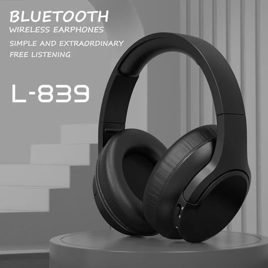 Black wireless headphones, model L-839, displayed on a gray stand. Text indicates Bluetooth, wireless earphones.