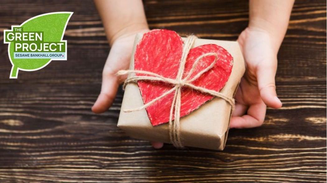 LIME a person holding a gift wrapped in brown paper with a red heart on it offering insurance advice