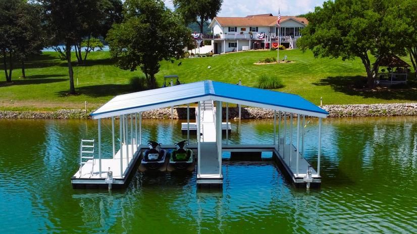 A wooden dock is in the middle of a lake.