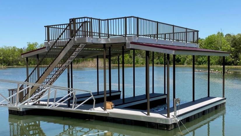 A wooden dock is in the middle of a lake.