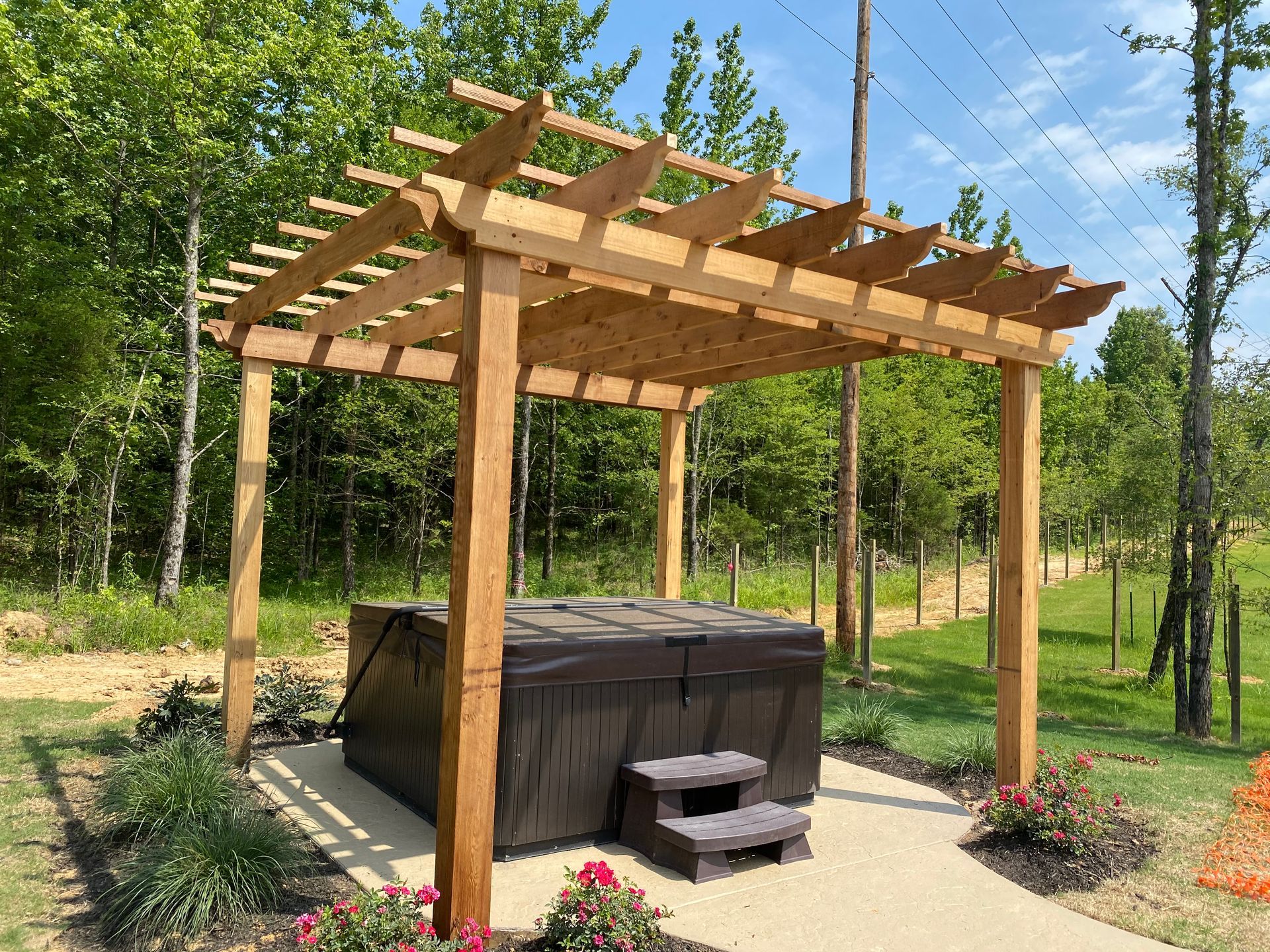 Freestanding pergola on hottub pad