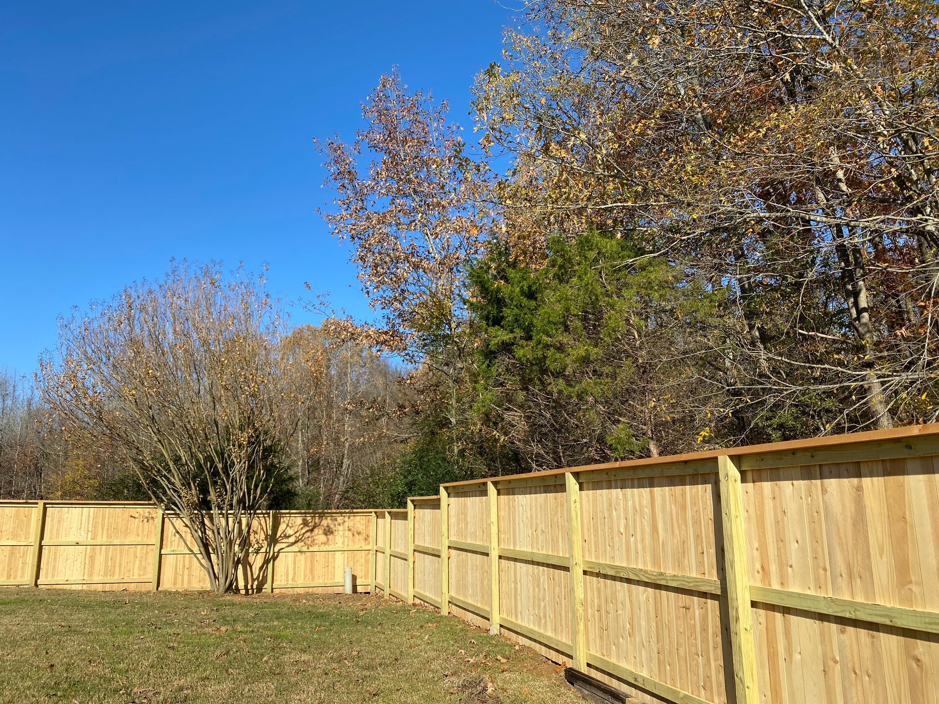 6 foot picture frame. style fence using 6x6 post with cap and fascia