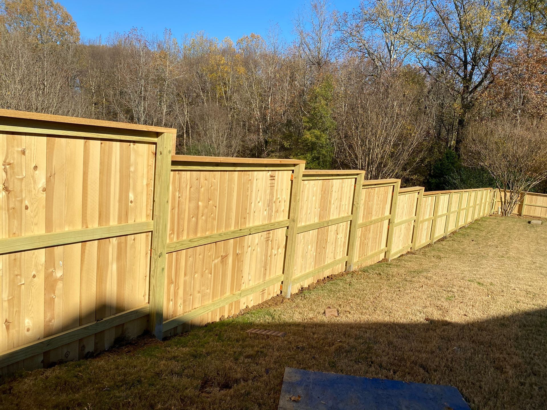 6 foot cedar fence with cap and fascia
