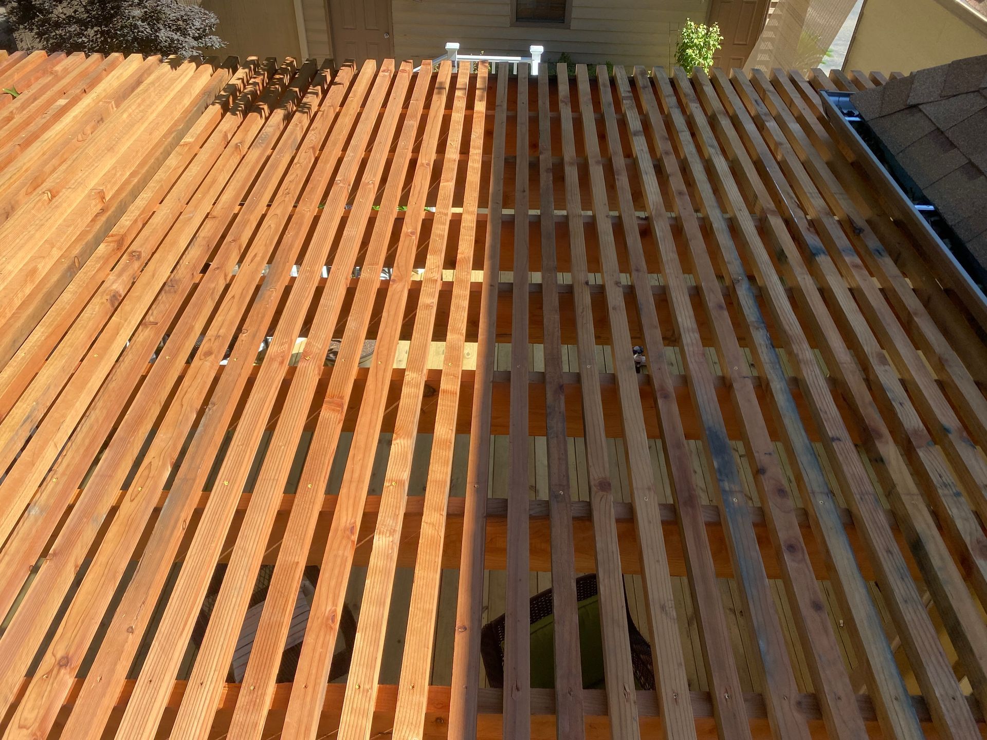 2x2 redwood slats on top of pergola