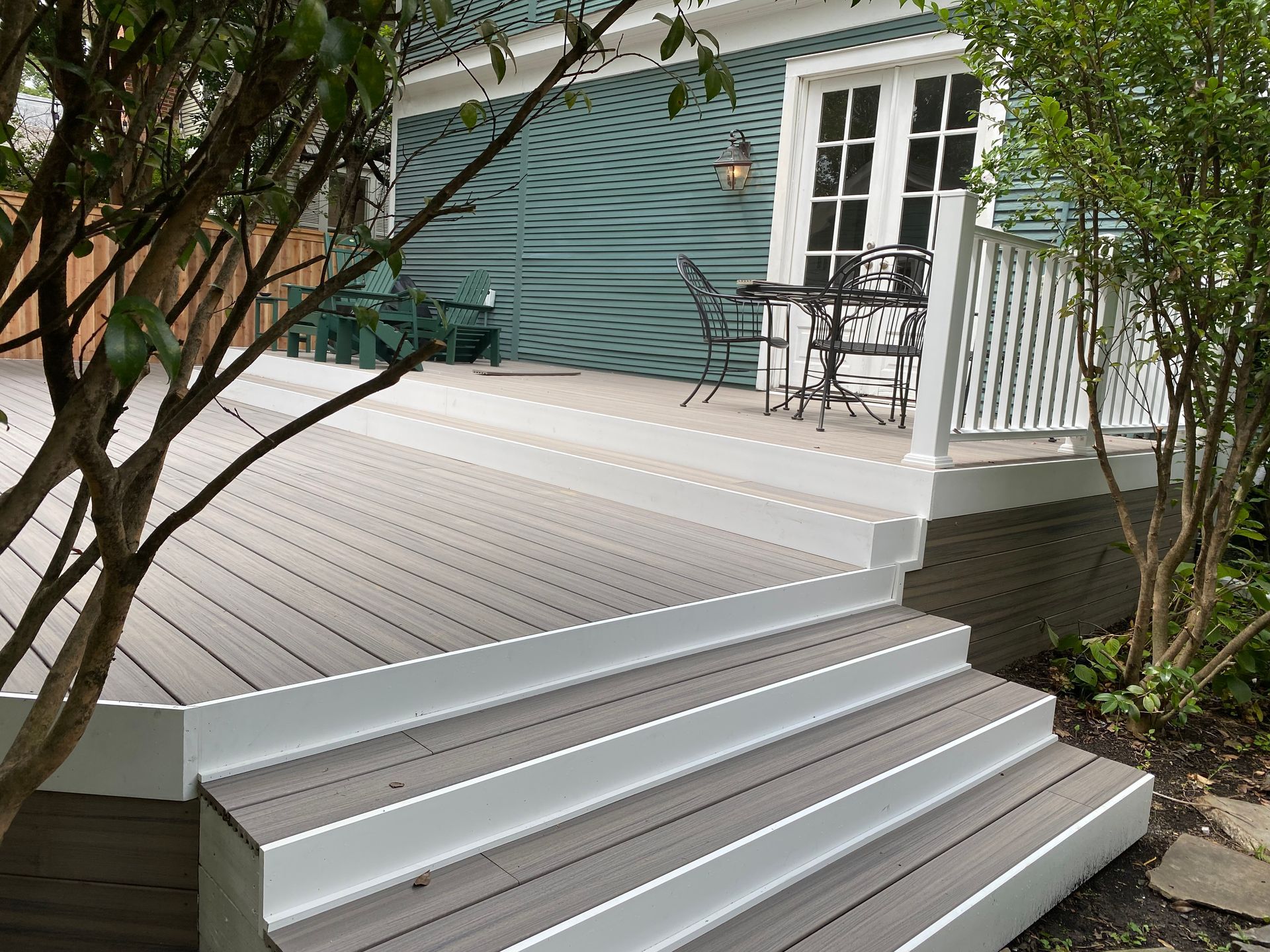 Composite deck with composite railing