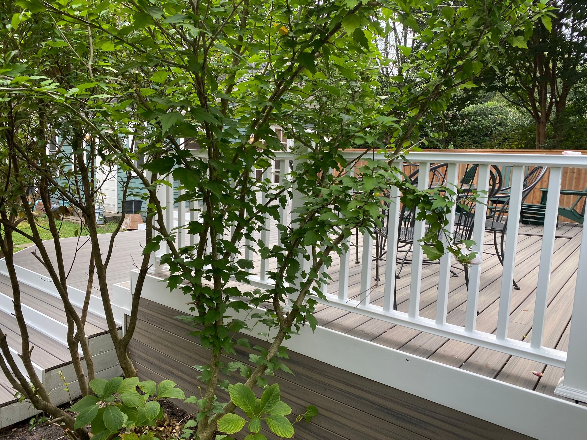 Composite deck with composite railing