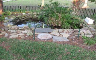 Small Pond With Grass — Jacksonville, FL — K & R Pond Care Inc