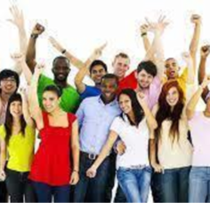 A group of people are standing next to each other with their hands in the air.