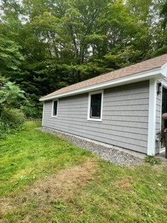 Gray Siding with Two Windows — Chicopee, MA — Nova Home Improvements