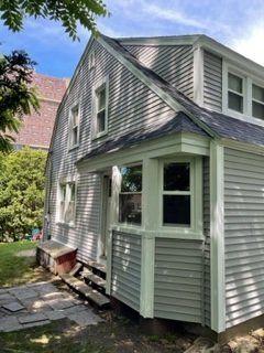 Window and White Siding — Chicopee, MA — Nova Home Improvements