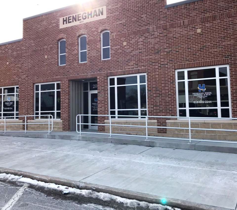 A brick building with the word heneghan on it