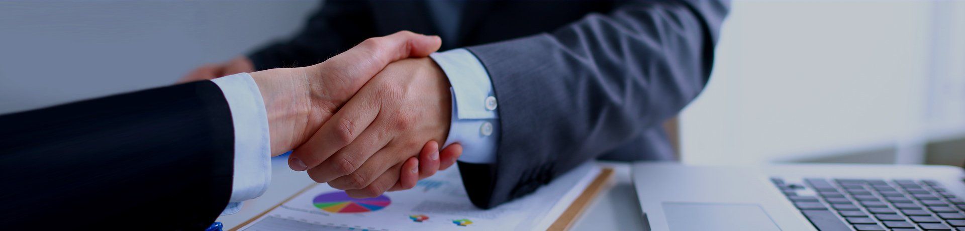 accountant shaking hands with customer