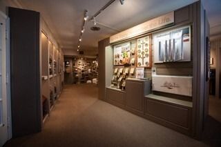 A long hallway with a lot of displays on the wall.