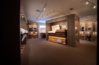 A room with a lot of coffins in it