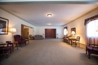 A large room with a lot of furniture in it.