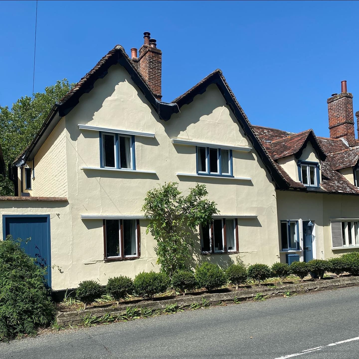 Professionally painted traditional Limewashed Exterior walls of timber framed period property near Sudbury in Suffolk | DMB Painting & Decorating.