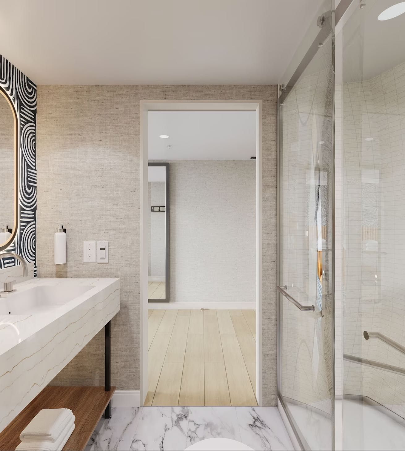 A bathroom with a sink a toilet and a mirror