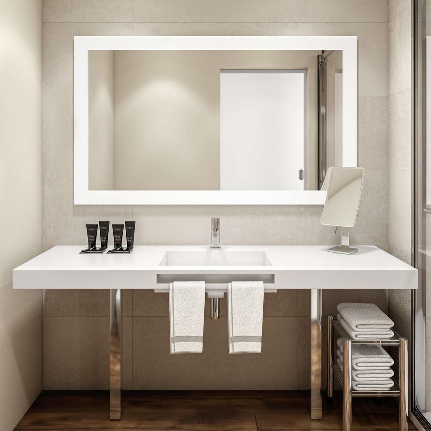 A bathroom with a sink and a large mirror