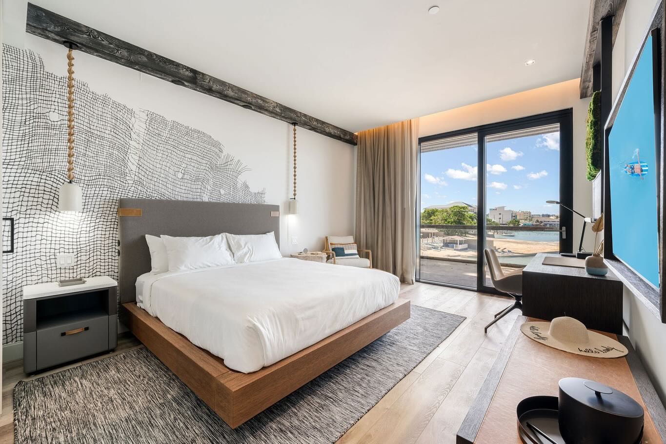 There is a large bed in the middle of the room.