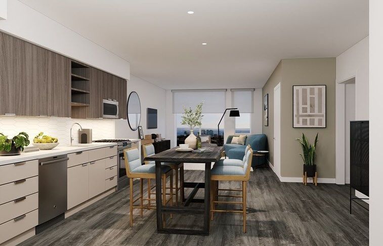 An artist 's impression of a kitchen and dining room in a house.