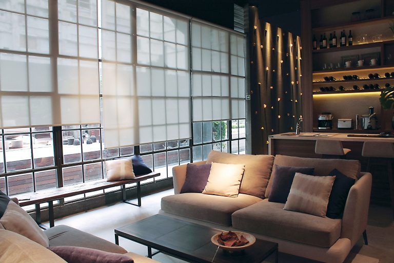 A living room with a couch and a coffee table