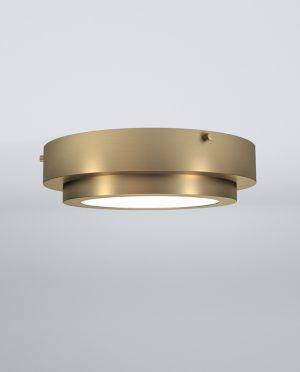 A brass ceiling light with a white light inside of it.