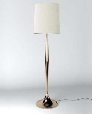 A lamp with a white shade is sitting on a white surface.
