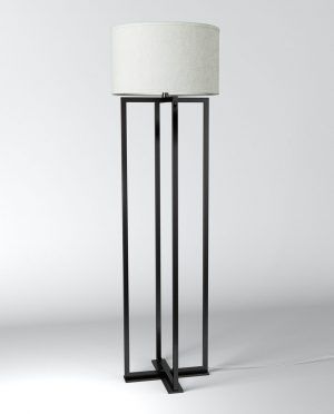 A black floor lamp with a white shade on a white surface.