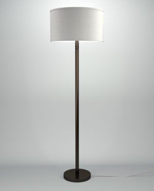 A floor lamp with a white shade on a white background.