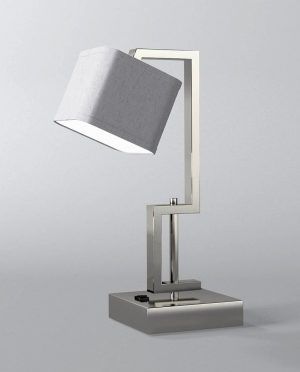 A table lamp with a square shade on a white background