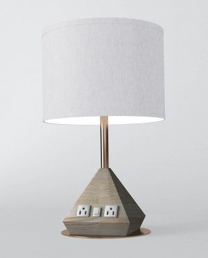 A table lamp with a white shade and a wooden base