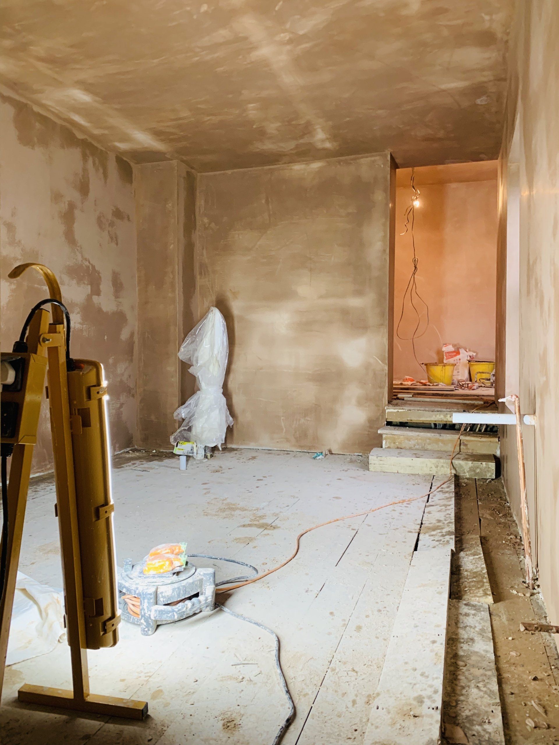 Image of project in progress - Residential renovation project with entire room having recently been re-plastered