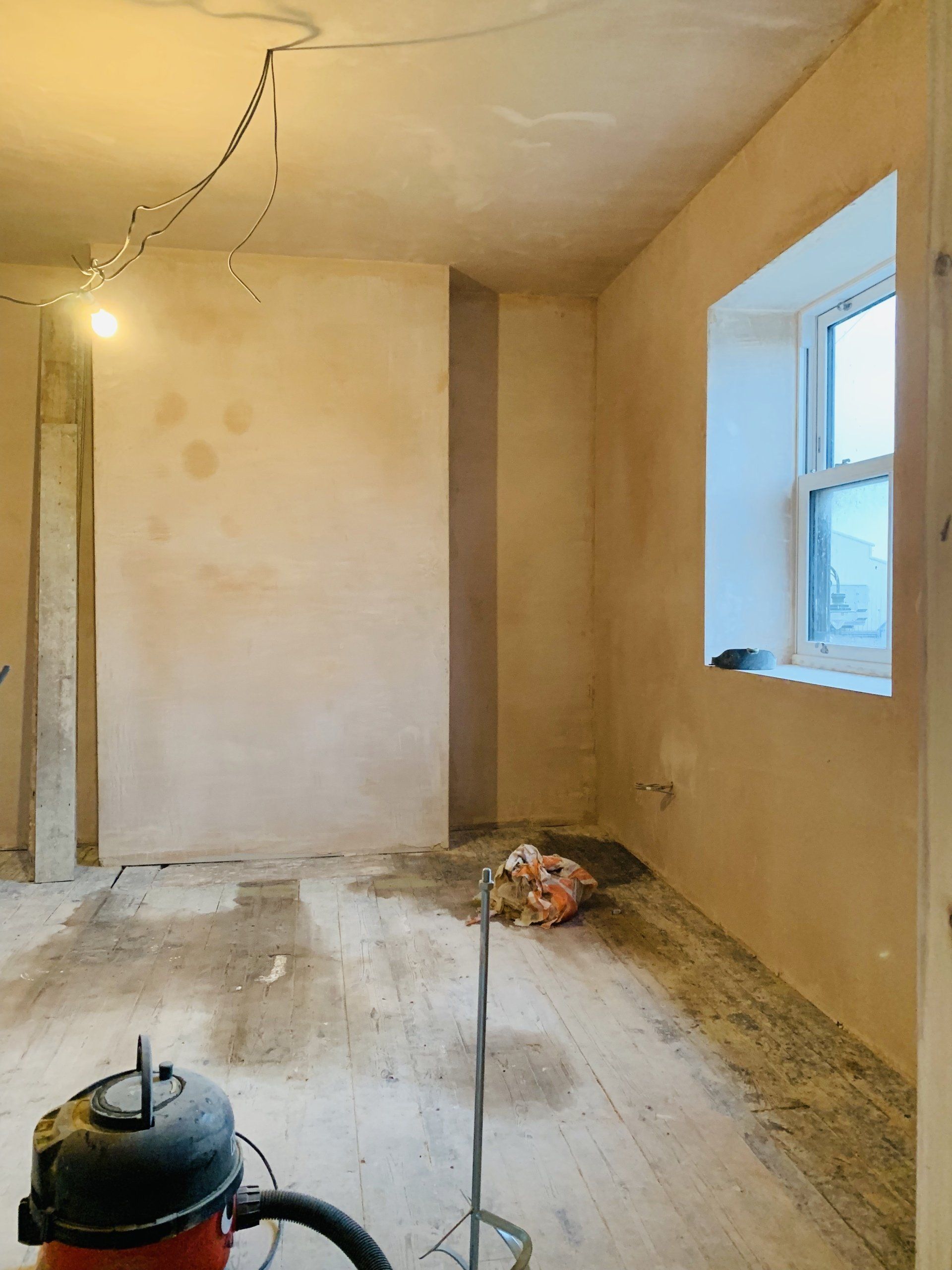 Image showing previous project - Empty room that has been fully re-plastered and cleared, ready for decoration