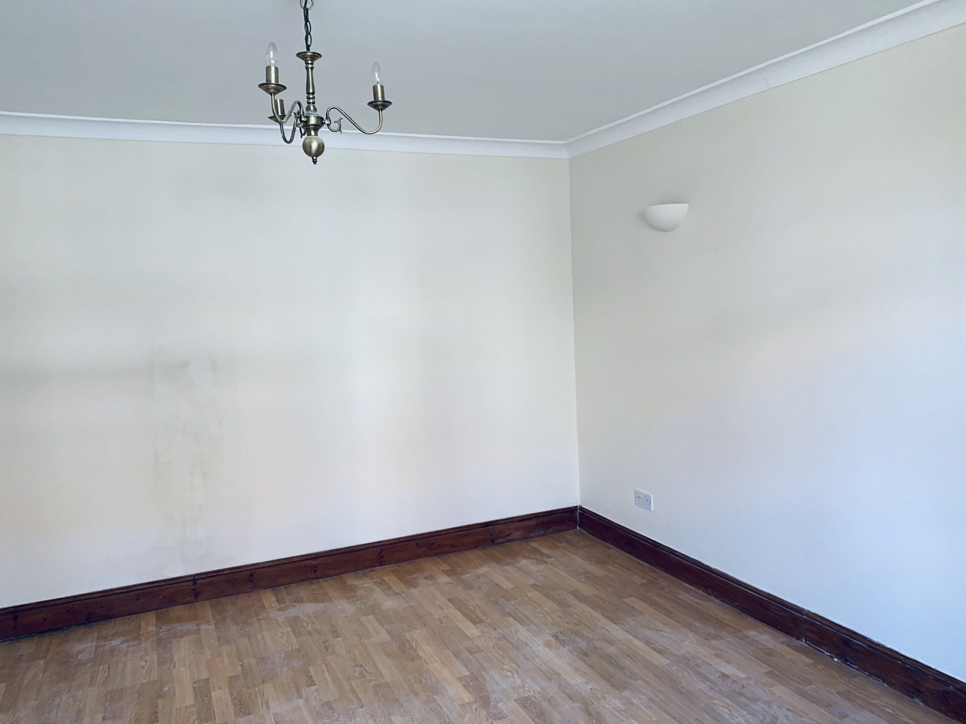 Image showing completed project - Empty room having been re-plastered, re-decorated and all mess cleared away