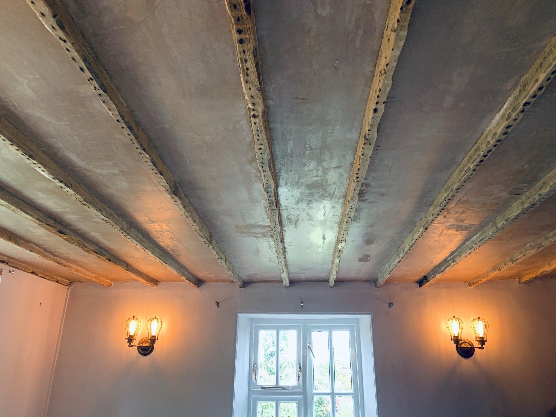 Image of previous project - Period property with exposed beams being re-plastered
