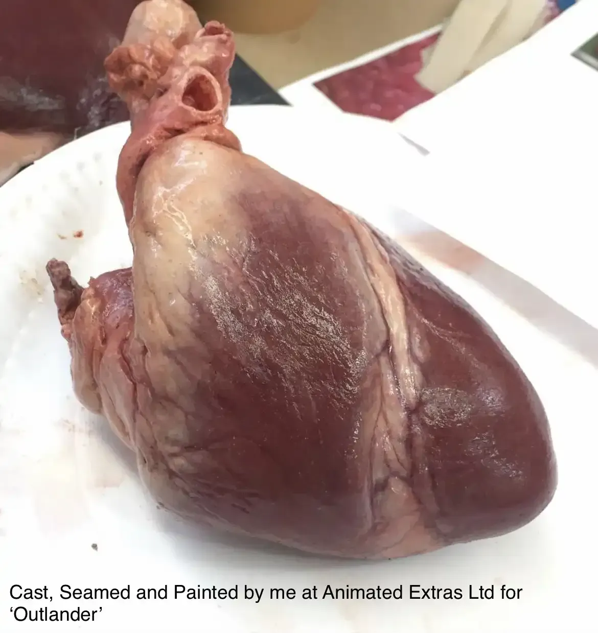 A heart-shaped prop, cast, scarred, and painted, from the production 