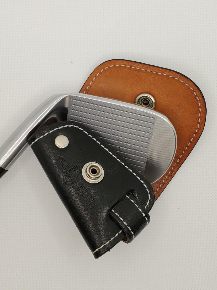 Golf club within black and brown Special edition  ClubShield with white stitching.