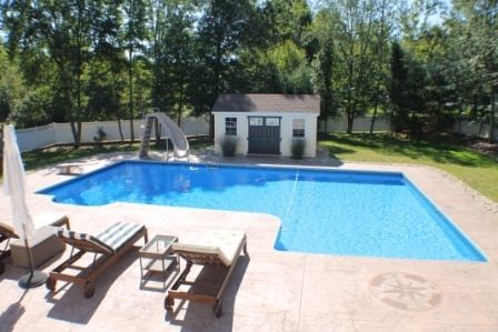 True L inground pool with 6″ radius, full end stair, and swim out