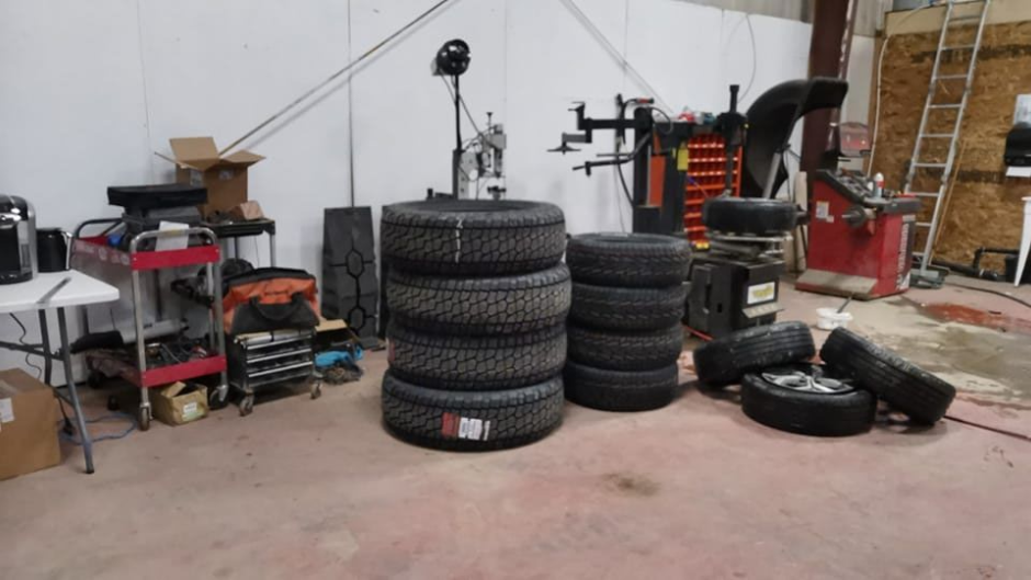 Stack Of Car Tires Inside Auto Repair Workshop | KK’S GARAGE