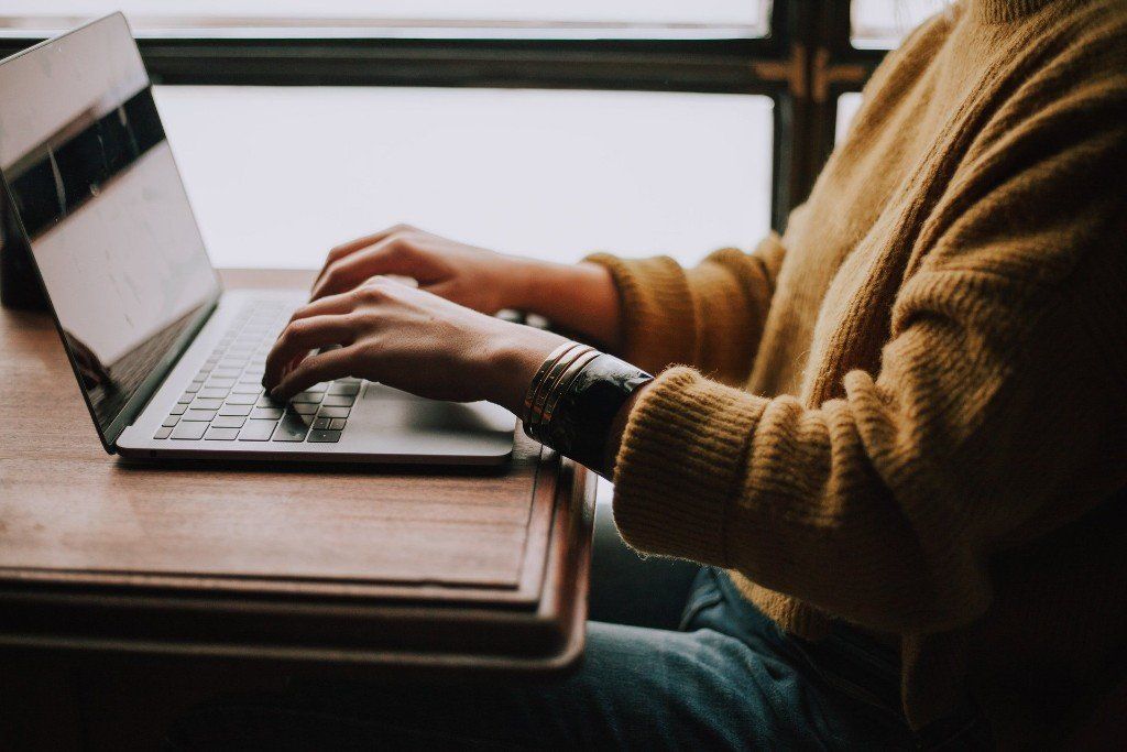 Person on computer. Check out the Signal Driving & Traffic School online demo!  Test out our online drivers education course before enrolling.